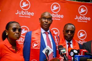Jubilee Party Secretary General Moitalel Ole Kenta addressing the media flanked by other party officials.