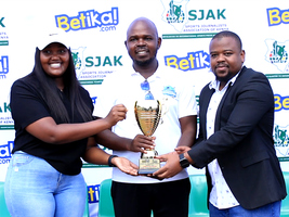 Kisumu Youngsters Hockey Club head coach John Shivisi (centre) named Betika/SJAK Coach of the Month for February after leading his team to Super League title and promotion.