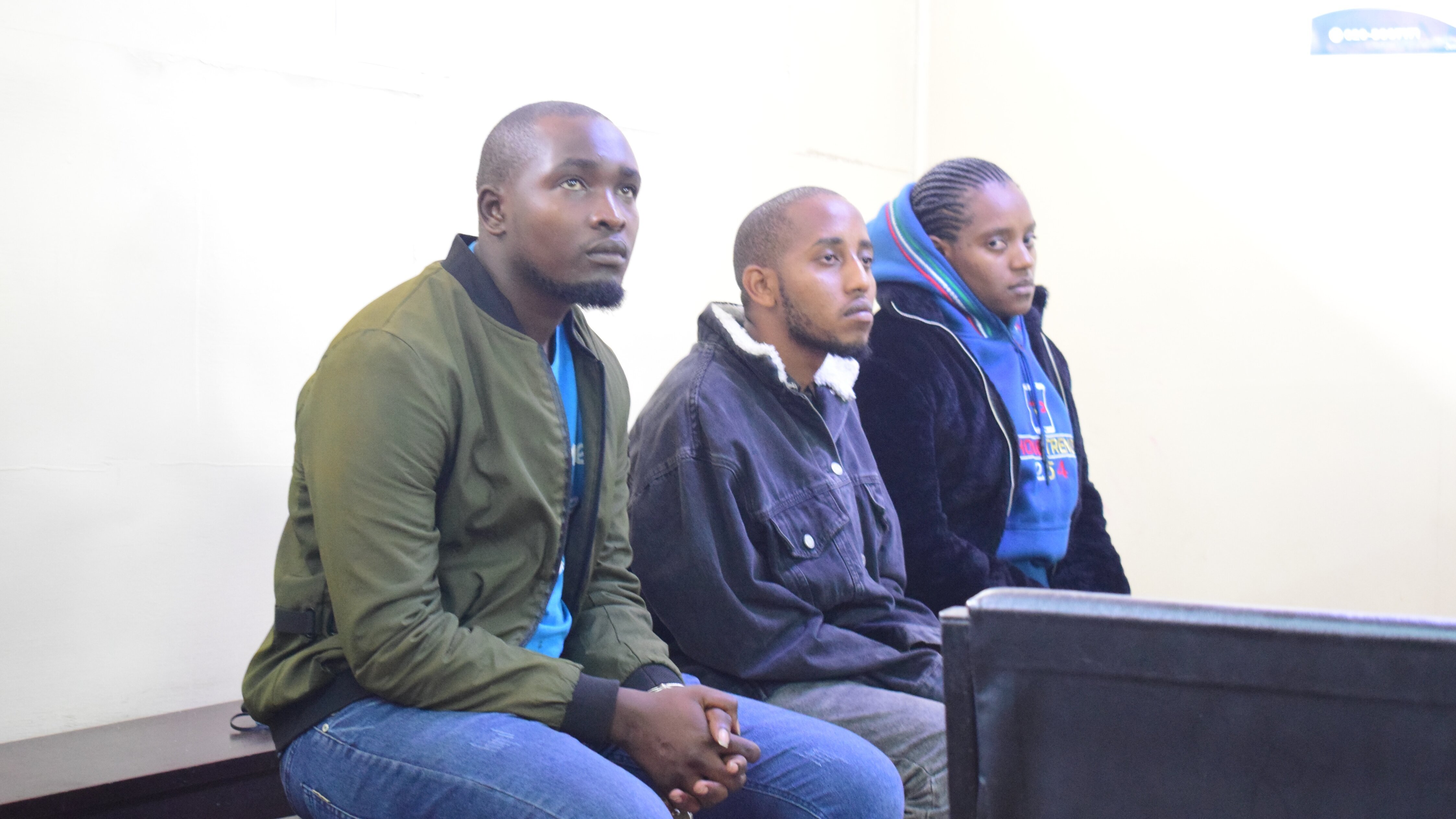 Lewis Gachoki, Alfred Macharia, and Charity Wangu at the Makadara Law Courts