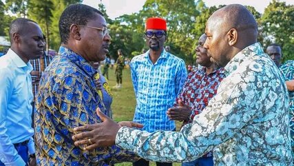 National Assembly Speaker Moses Wetang'ula (left) welcomes Interior Cabinet Secretary Kipchumba Murkomen at their home in Mukhweya village, Kabuchai, Bungoma County. Mr Murkomen condoled with the family following the passing on of their mother--Mama Annah Nanyama Wetang'ula. 