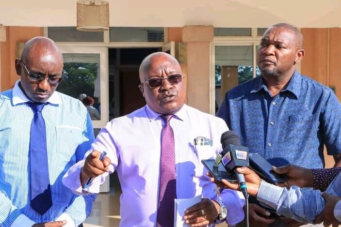 Machakos County Secretary Muya Ndambuki addressing journalists outside Machakos Level 5 Hospital