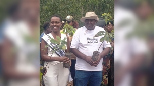 Machakos Chief Officer for Environment Simon Kitheka joins Miss Environment Kenya 2026, Regina Syombua, during a tree-planting exercise at Matetani Forest in Kangundo Sub-county on Saturday, March 21, 2026.
