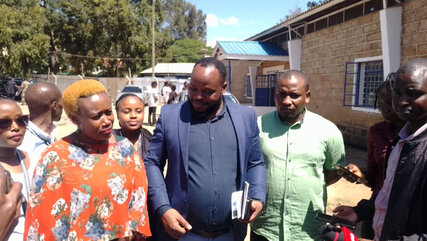 Protective Security Industry Association (PSIA) Secretary-General Mugambi Lichena with Women in Safety Excellence (WISE) representative Monica Kimeu