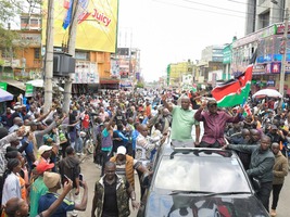 Siaya Governor James Orengo, standing on a car rooftop alongside Vihiga Senator Godfrey Osotsi, acknowledges greetings from supporters of the Linda Mwananchi faction of ODM in Nakuru on April 19, 2026.
