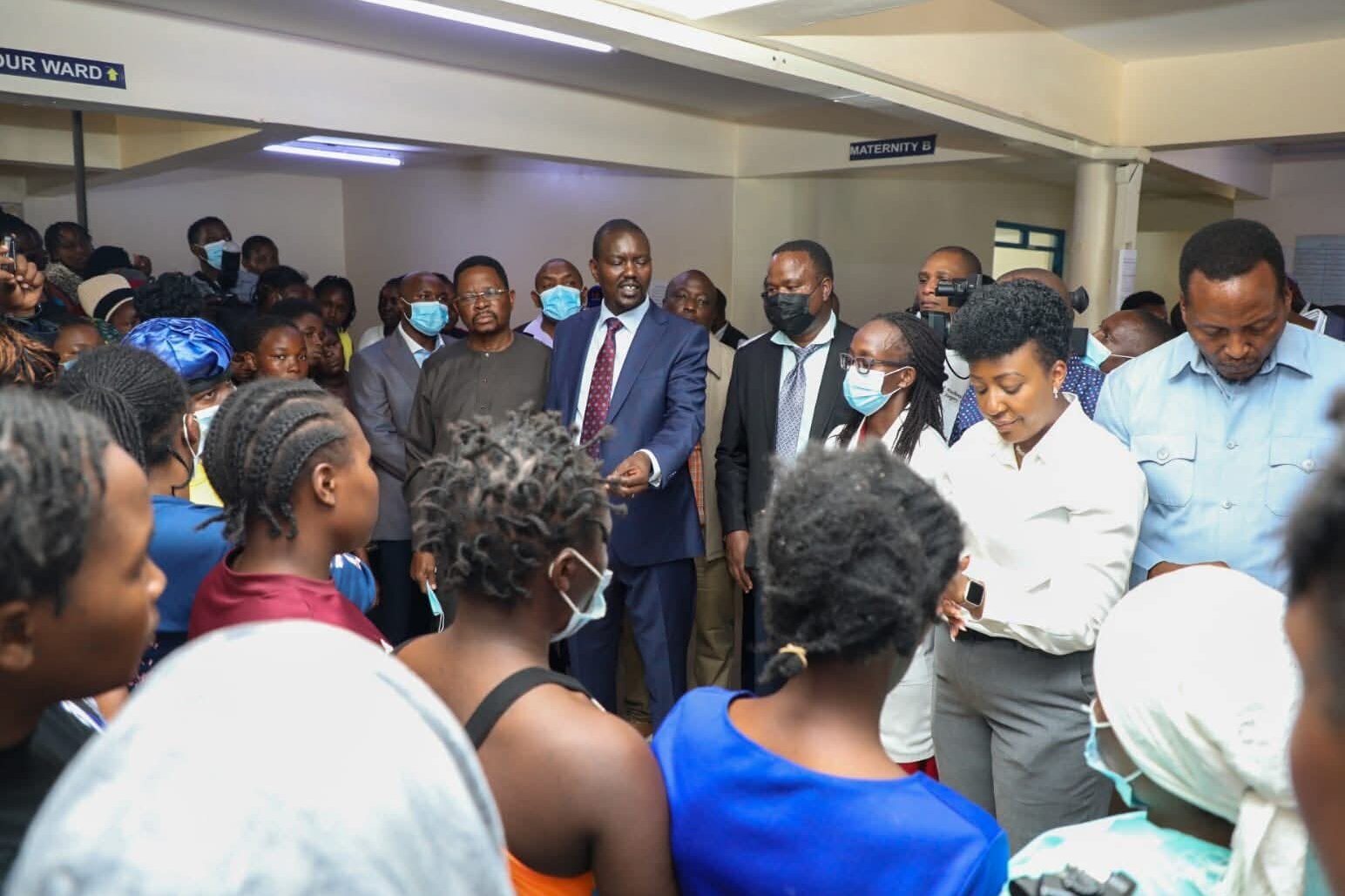 Senate Health Committee members listening to stranded mothers during their visit to Kiambu