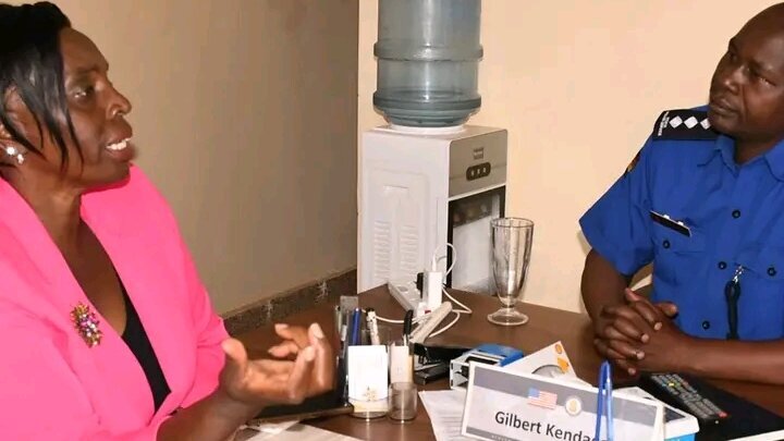 Joyce Kamene talks with Tala OCS Gilbert Kendago
