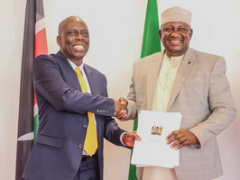 Sports CS Salim Mvurya (right) receives the draft Sports Bill, 2026 and the National Sports Policy 2025 from the taskforce chairman John Ohaga at Talanta Plaza in Nairobi