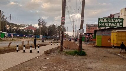 Anti-riot police officers 'escort' protesters along Kamiti Road at Mirema area