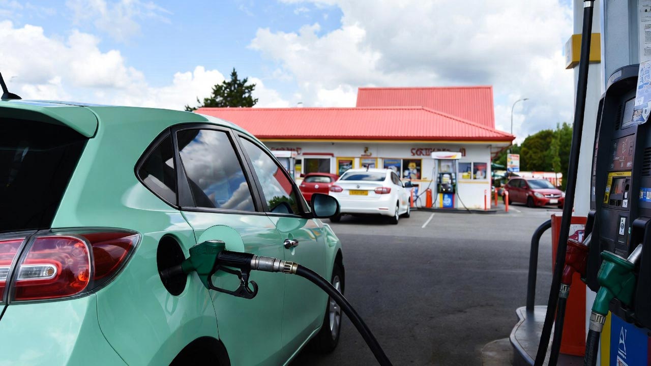A car at a filling station for refueling.