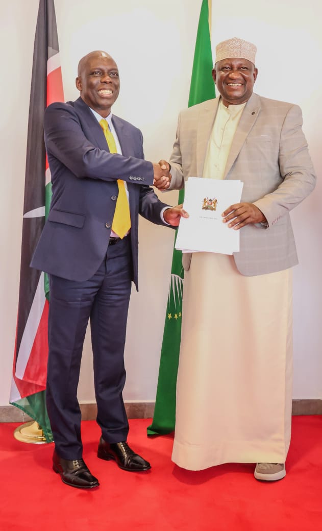 Sports CS Salim Mvurya (right) receives the draft Sports Bill, 2026 and the National Sports Policy 2025 from the taskforce chairman John Ohaga at Talanta Plaza in Nairobi